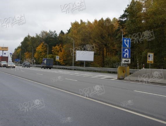М-1 «Беларусь», 23км+050м перед поворотом на улицу Восточная, левая сторона